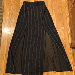 Split leg skirt with gold metal detail